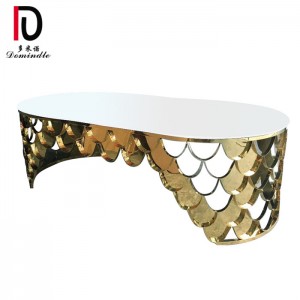 Scales dining table gold stainless steel