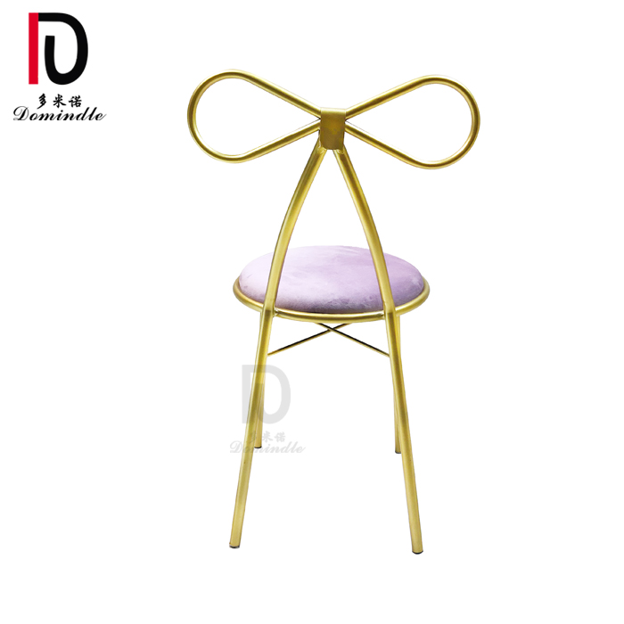 new modern wedding bow back stackable gold iron chair for events