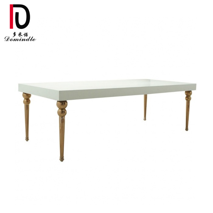 white MDF top with gold stainless steel legs dining table for events