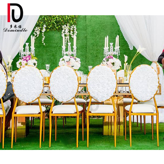 OEM Metal Wedding Chair –  Wholesale stackable gold iron frame flower back design wedding chair – Dominate