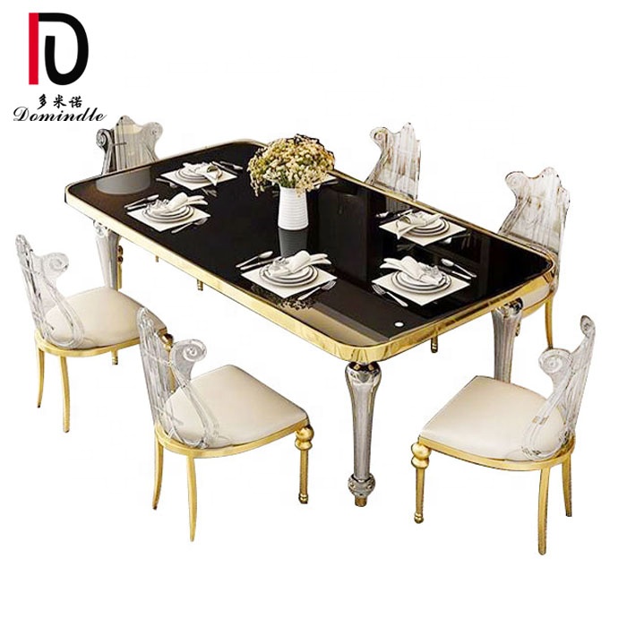luxe mirror table with stainless steel legs and gold rim for wedding