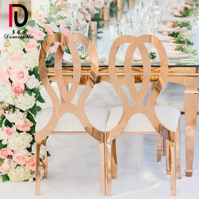 China Party Gold Stackable Hotel Chair –  dominate elegant stackable stainless steel cross back wedding banquet chair – Dominate