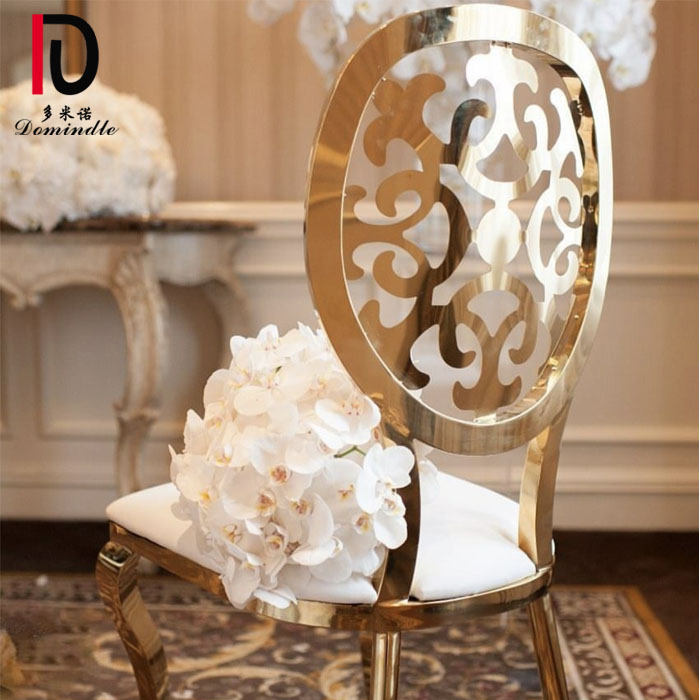 Dominate chic luxe featured banquet hall stainless steel trim wedding chair gold
