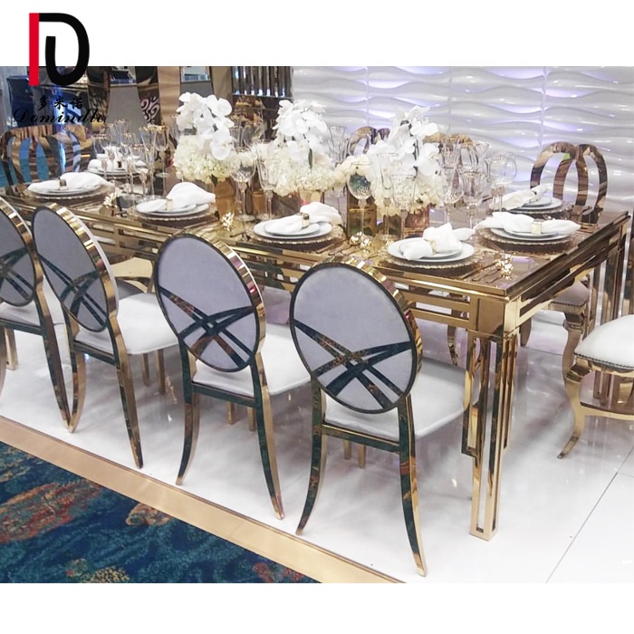 China Gold Modern Dining Table –  2019 New design mirror glass top stainless steel dining table for wedding – Dominate