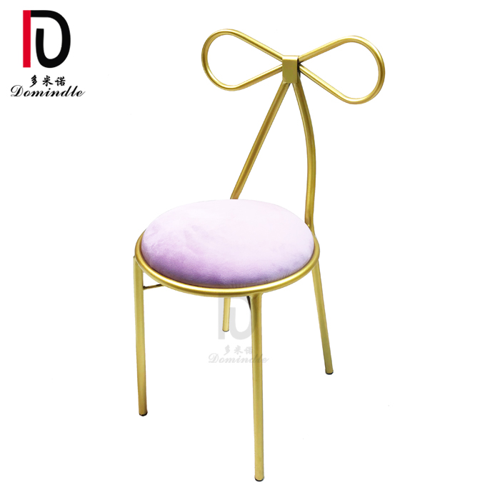 new modern wedding bow back stackable gold iron chair for events