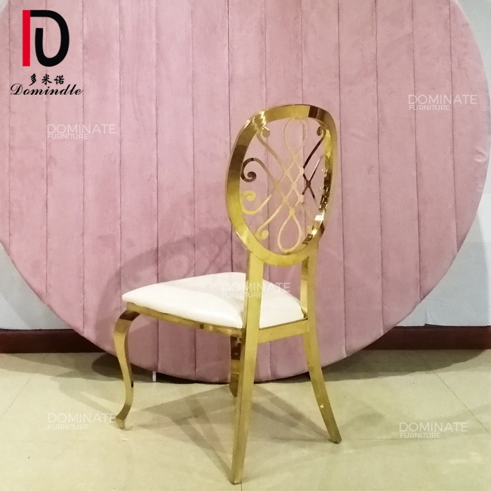 OEM Gold Staking Hotel Chair –  Hotel furniture pu cushion golden metal rental shop use carved wedding chairs – Dominate